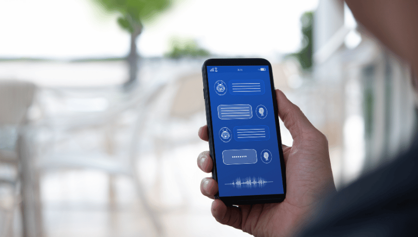 A man using a chatbot on his mobile phone